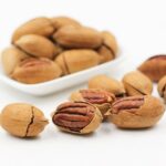 pecans, nuts, cracked, open, protein, food, snack, pecan nuts, shelled nuts, isolated, pecans, pecans, nuts, nuts, nuts, nuts, nuts